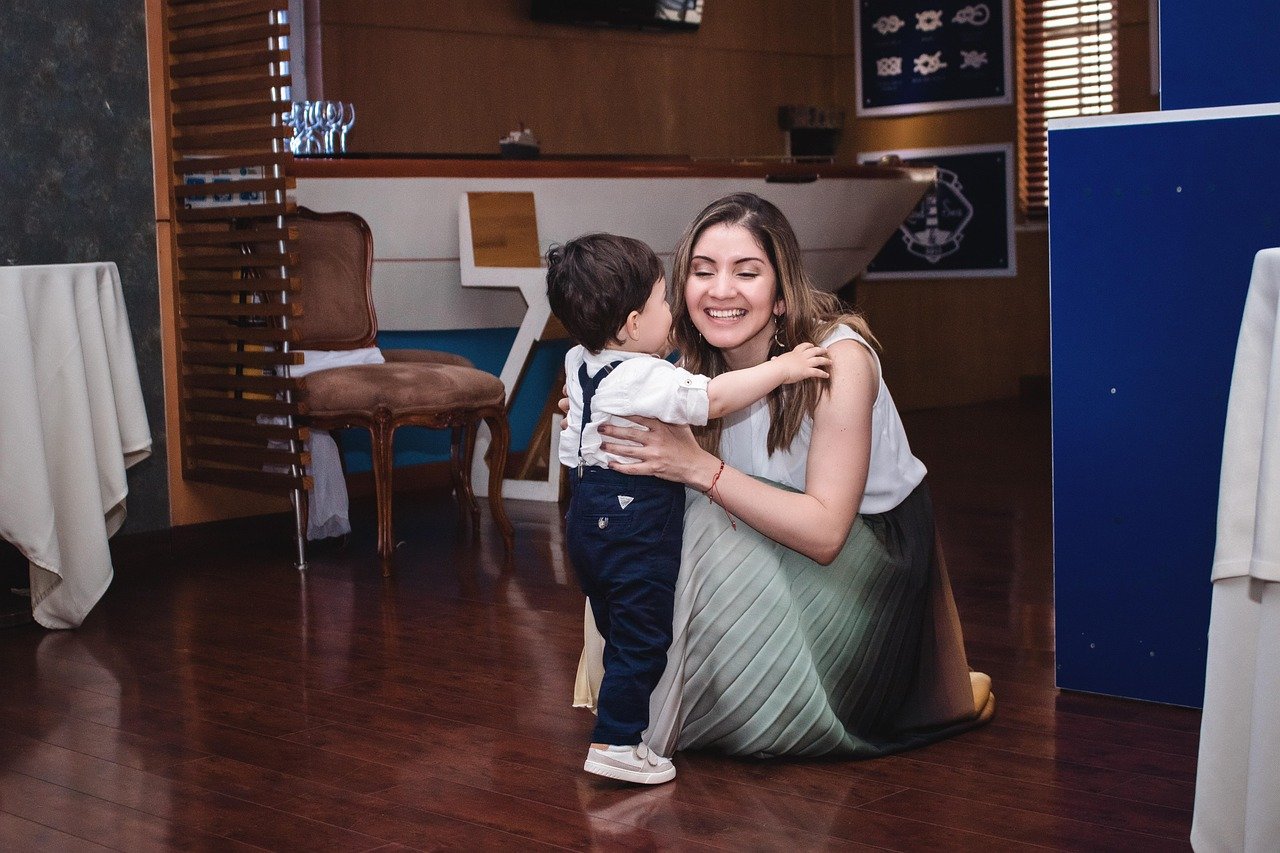 Mother hugging her son